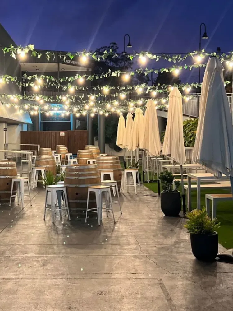 the riverdale bar and courtyard area with tables and chairs set up for drinks